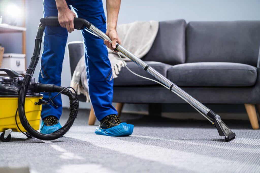 person-cleaning-carpet