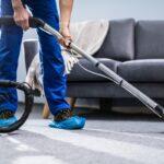 person-cleaning-carpet